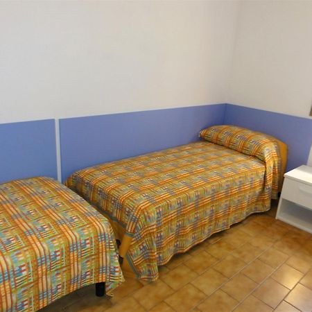 Reji - Appartamenti Bibione Habitación foto